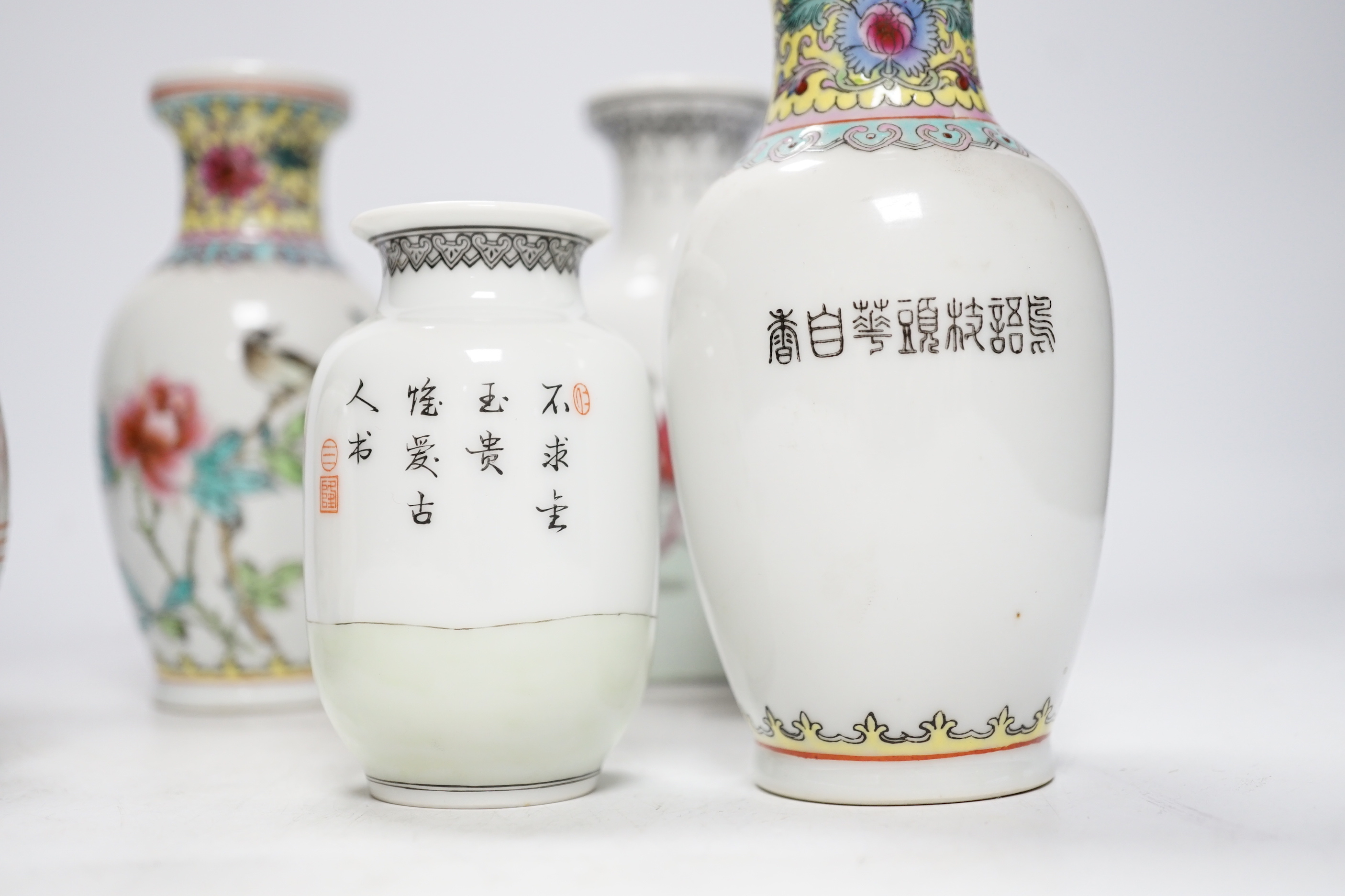 Four Chinese famille rose vases and a jar, 14.5cm